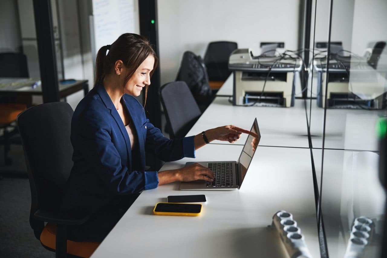 Professional working with clients across markets